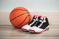 Sport Shoes And A Basketball Royalty Free Stock Photo