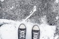 Sport shoes on street pavement