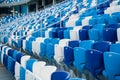 Sport stadium Plastic chairs in a row.