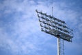 Sport stadium spotlight with blue sky background. Football and soccer light lamp Royalty Free Stock Photo