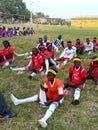 Sport Students sitting on the grass for sport class Royalty Free Stock Photo