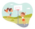 Sport summer camp, children play basketball fun game, jump high to throw ball into basket Royalty Free Stock Photo