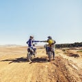 Sport, teamwork or people on motorcycle outdoor on dirt road before racing, challenge or competition on mockup