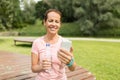 Woman with smartphone, water and fitness tracker Royalty Free Stock Photo