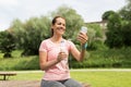 Woman with smartphone, water and fitness tracker Royalty Free Stock Photo