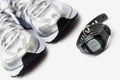 Sport watch and running shoes Royalty Free Stock Photo