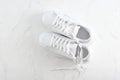 Sport white sneakers on white background