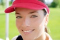 Sport woman closeup face sun visor cap