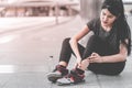 Sport woman having an injury on her ankle foot Royalty Free Stock Photo