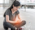 Sport woman having an injury on her wrist hand