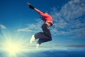 Sport woman jumping and fly over sky and sun Royalty Free Stock Photo