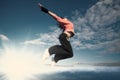 Sport woman jumping and fly over sky and sun Royalty Free Stock Photo