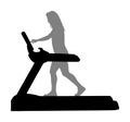 Sport woman running on treadmill in gym  silhouette. Girl on running track cardio training. Fitness lady personal trainer Royalty Free Stock Photo