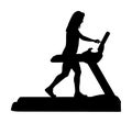 Sport woman running on a treadmill in gym silhouette. Royalty Free Stock Photo