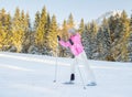 Sport woman on ski in winter resort Royalty Free Stock Photo