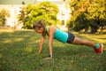 Sport woman training outside in city park . Fall time on street Royalty Free Stock Photo