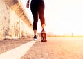 Sport woman walking towards on the road side. Step concept Royalty Free Stock Photo