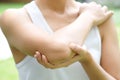 Sport women have elbow pain .Health concepts and treatments