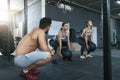 Sport Women Training With Crossfit Balls At Workout Gym