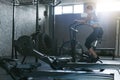 Sport Workout At Gym. Woman Training On Crossfit Bicycle