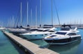 sport yachts moored at the pier on a sunny day Royalty Free Stock Photo