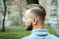 Sport young man with a modern trendy fade profile haircut for barbershop Royalty Free Stock Photo