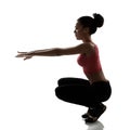 sport young woman athlete doing squatting exercise, active fitness girl silhouette studio shot over white Royalty Free Stock Photo