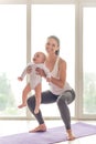 Sporting mom and baby Royalty Free Stock Photo