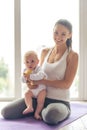 Sporting mom and baby Royalty Free Stock Photo