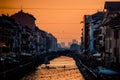 sporty people have fun with canoe at Navigli Milano Italy winter xmas time