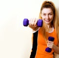 Sportive athletic woman working out with dumbbells Royalty Free Stock Photo