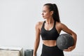 Beautiful young fitness girl exercising with fitness ball Royalty Free Stock Photo