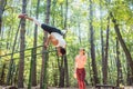 Sportive couple doing workout in outdoor gym Royalty Free Stock Photo