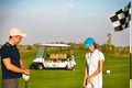 Sportive family playing golf on a golf course Royalty Free Stock Photo