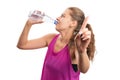 Sportive female drinking water making wait gesture using index
