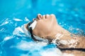 Sportive girl in the swim pool Royalty Free Stock Photo