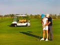Sportive happy family playing golf Royalty Free Stock Photo