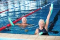 Sportive senior couple doing exercises in indoor Royalty Free Stock Photo