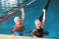 Sportive senior couple doing exercises