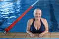 Sportive senior woman in indoor pool