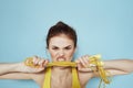 Sportive woman skipping rope exercise gym fitness blue background Royalty Free Stock Photo