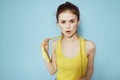 Sportive woman skipping rope exercise gym fitness blue background Royalty Free Stock Photo