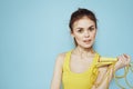 Sportive woman skipping rope exercise gym fitness blue background Royalty Free Stock Photo