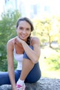 Sportive young woman in central park excercising Royalty Free Stock Photo