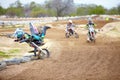 Sports, accident and man biker in a race on a dirt road in the desert with competition for hobby. Fitness, training and Royalty Free Stock Photo