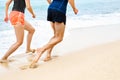 Sports. Athletic Runners Legs Running On Beach. Workout. Healthy