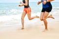Sports. Athletic Runners Legs Running On Beach. Workout. Healthy
