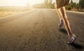 Sports background. Runner feet running on road Royalty Free Stock Photo