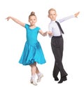 Sports ballroom dancing. Couple of kids, boy and girl  on isolated white background Royalty Free Stock Photo