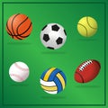Sports balls icons set. Balls simple icons on green background Royalty Free Stock Photo
